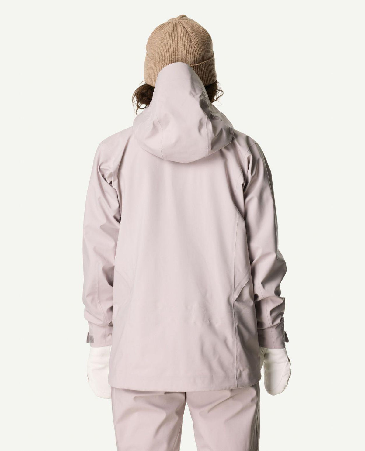 Baksida av Houdini Rollercoaster Jacket II dam i färgen lila med uppfälld huva.