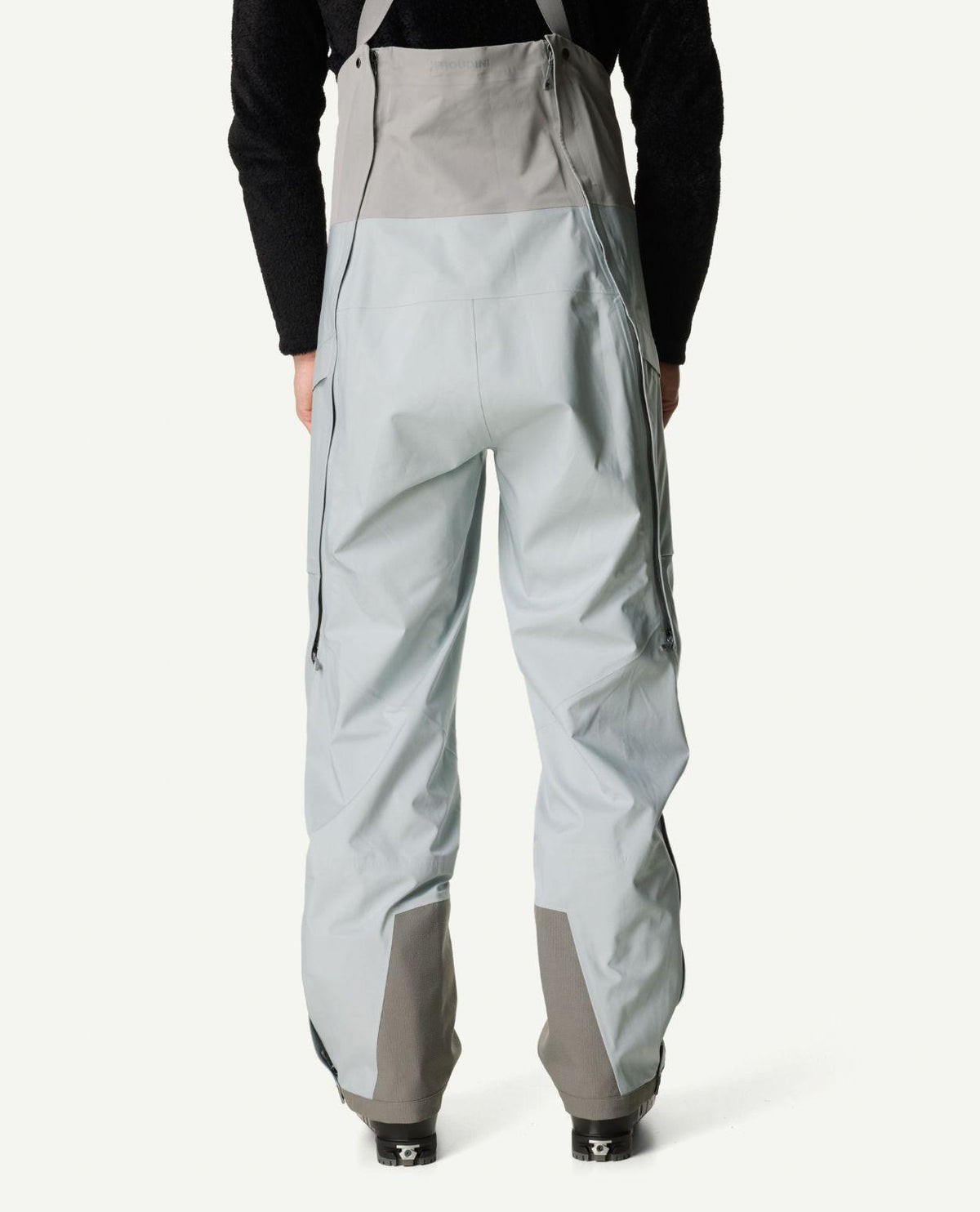 Houdini Rollercoaster Bib Pants II i grått för herrar, bakifrån.