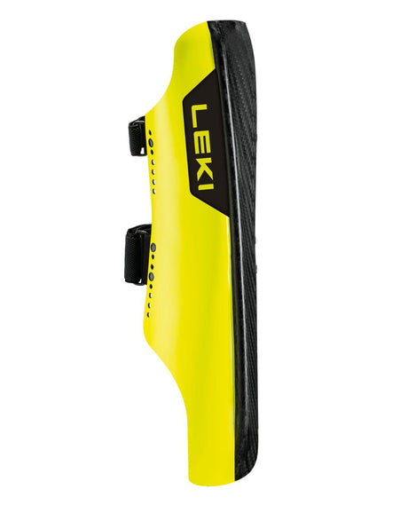 Leki Shin Guard Carbon Railroad Race Short, benskydd i neongult och kolfiber för alpina tävlingsåkare.