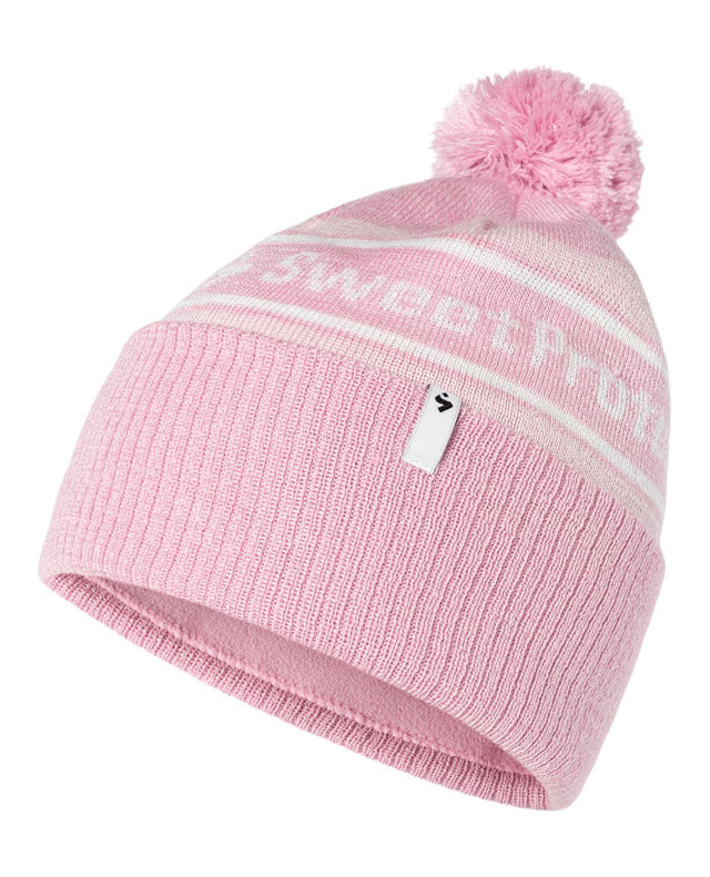 Lila Sweet Protection Method Pom Beanie, ribbstickad tofsmössa med vit textrand för alpina skidåkare.