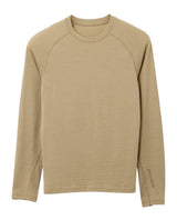 Houdini Puremerino Crew dam i färgen powder green, ett långärmat underställ i merinoull med rund halsringning.