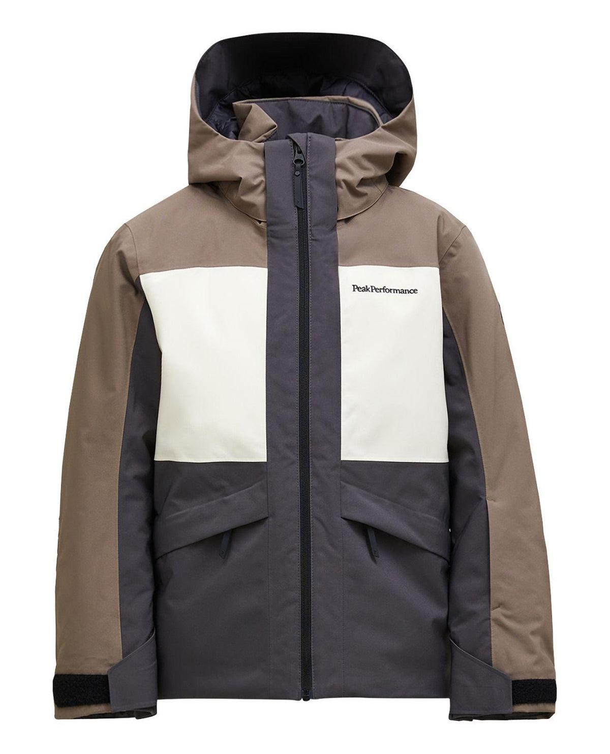 Peak Performance Gravity Insulated Jacket Junior i färgerna terrain tan och sand fog för skidåkning.