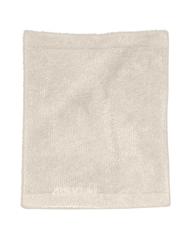 Beige fleecefoddrad halsvärmare från Houdini med diskret logotyp nedtill.