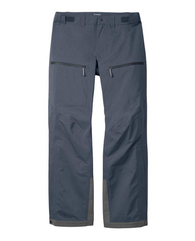 Houdini Ride Pants II skidbyxor i blått för herrar med dragkedjeförsedda fickor fram.