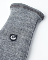 Hestra Gravita Merino Liner Mitt i grå merinoull med tydlig logotypdetalj.