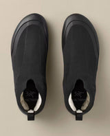 Arc'teryx Kragg Mid Men svarta approachskor sedda ovanifrån mot en neutral bakgrund med Vibram-sula och Betaspun-ull