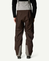 Houdini Rollercoaster Bib Pants II skidbyxor för herrar bakifrån i brunt och ljusgrått.