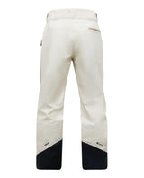 Peak Performance Alpine Gore-Tex 3L Pants Women i färgen Sand Fog visas bakifrån. Slitstarka dam skidbyxor med förstärkta svarta benslut och Recco-reflektorer.