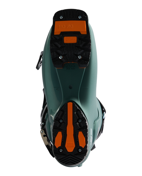 Undersidan av Rossignol Vizion 4B 130 Elite LV GW alpinpjäxa som visar GripWalk-sulor och detaljer.