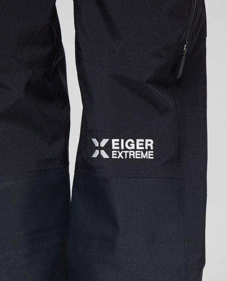 Mammut Eiger Free Pro HS Bib Pants Women - Svart skidbyxa detaljbild med Eiger Extreme-logga