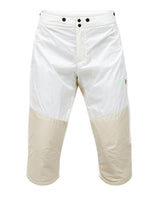 Peak Performance 40Y R&D Gore-Tex skidbyxor för dam i vitt och beige med teknisk design.
