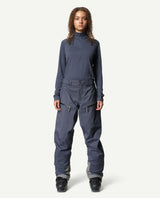 Houdini Ride Pants II dam i färgen hombre blue, påbyltade för skidåkning.