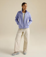 Arc'teryx Covert Cardigan för dam i lila Kasumi Heather-färg som fungerar perfekt som ett värmande mellanlager vid friluftsliv.