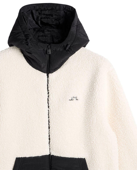 J.Lindeberg Varek Hybrid Zip Hood mellanlager i beige fleecematerial med svart huva och bröstdetalj för herr