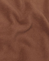 Närbild på det bruna fleecematerialet i Mammut Moonstone Hybrid ML Cardigan med mjuk struktur.