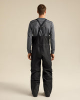 Arc'teryx Sabre Bib Men skidbyxor i svart färg visade bakifrån på modell.